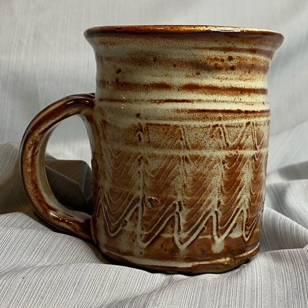 Art pottery glazed cup/mug color brown yellow.
